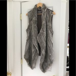 NWT. Grey fur vest. With knit back.